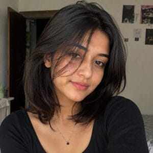 Elegant Indian woman in a luxury hotel lobby representing premium escort and companion services in Noida NCR with modern lifestyle atmosphere